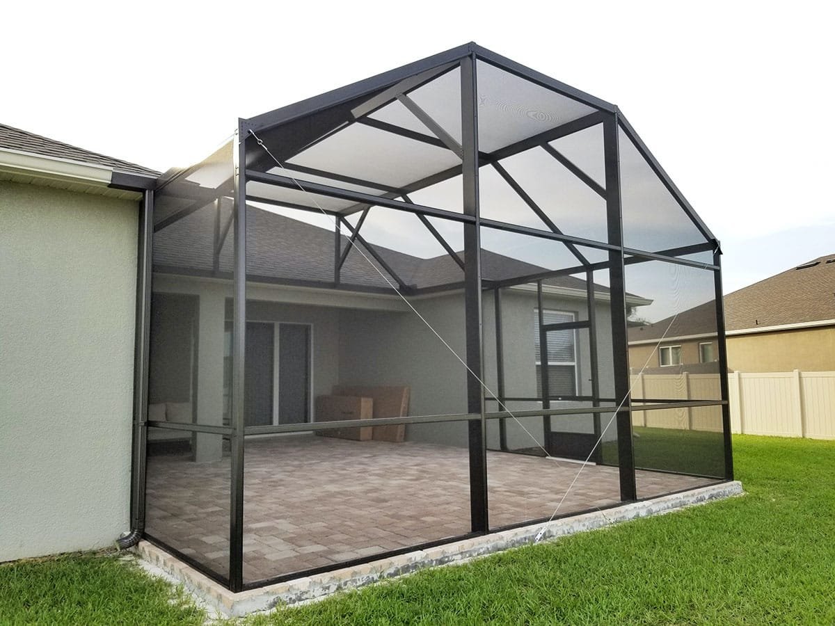 Aluminum lanai screen enclosure installation in Winter Haven, FL attached to home